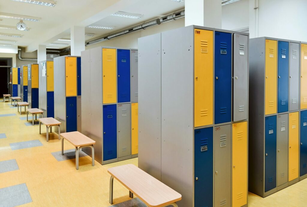 school hallway with colorful lockers